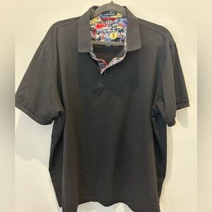 Black collared shirt with graphic print inside collar